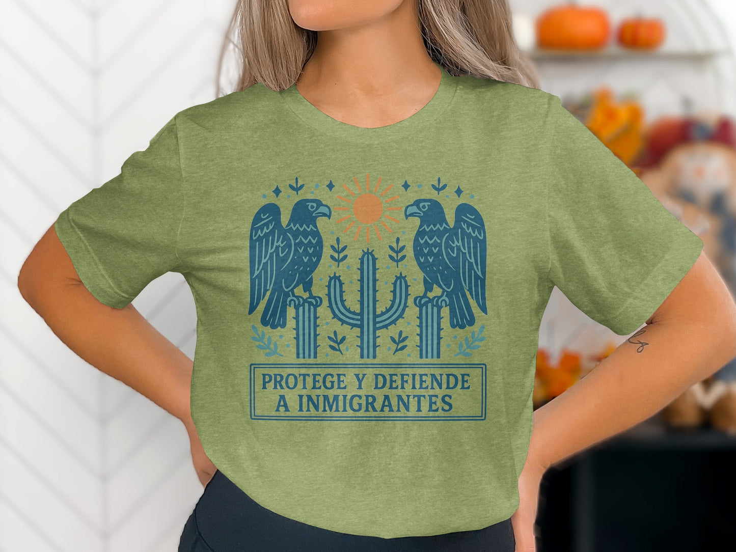 Protege y Defiende a Inmigrantes Graphic T-shirt product type