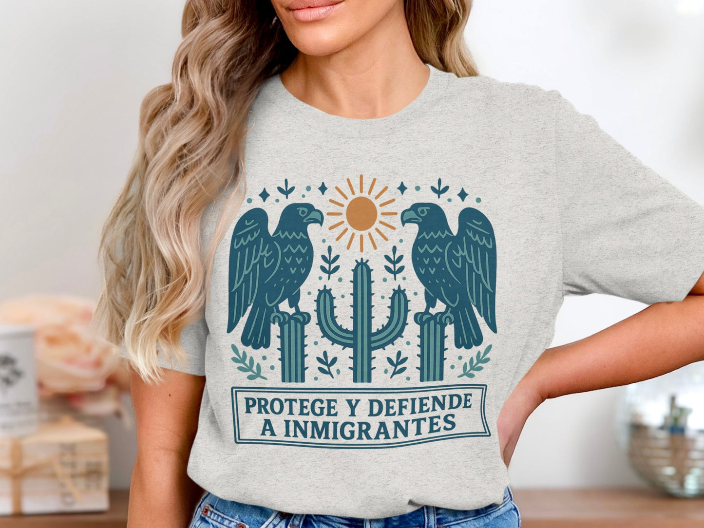 Protege Y Defiende A Inmigrantes Graphic T-shirt Product