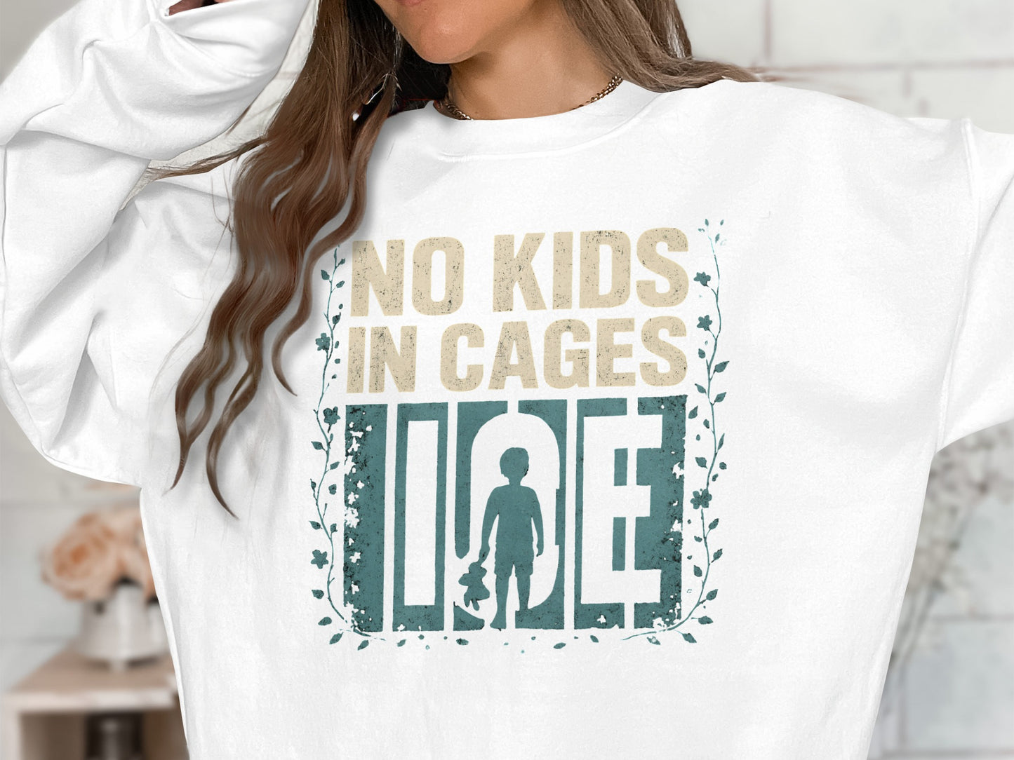 No Kids In Cages Long Sleeve Sweatshirt product