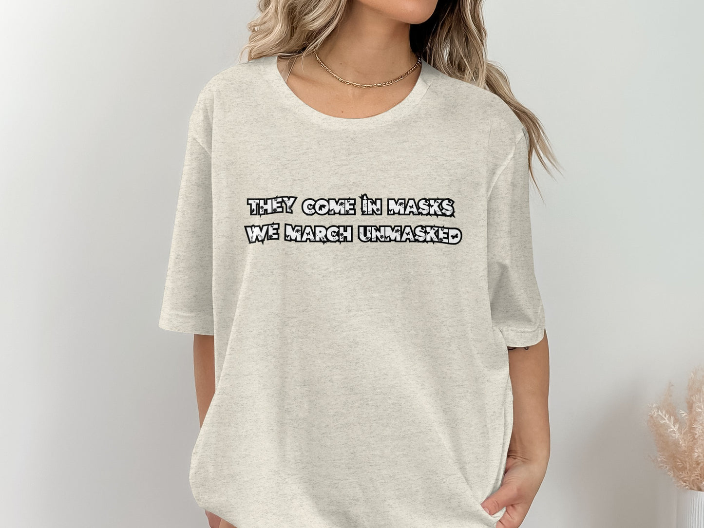 They Come In Masks We March Unmasked T-shirt product