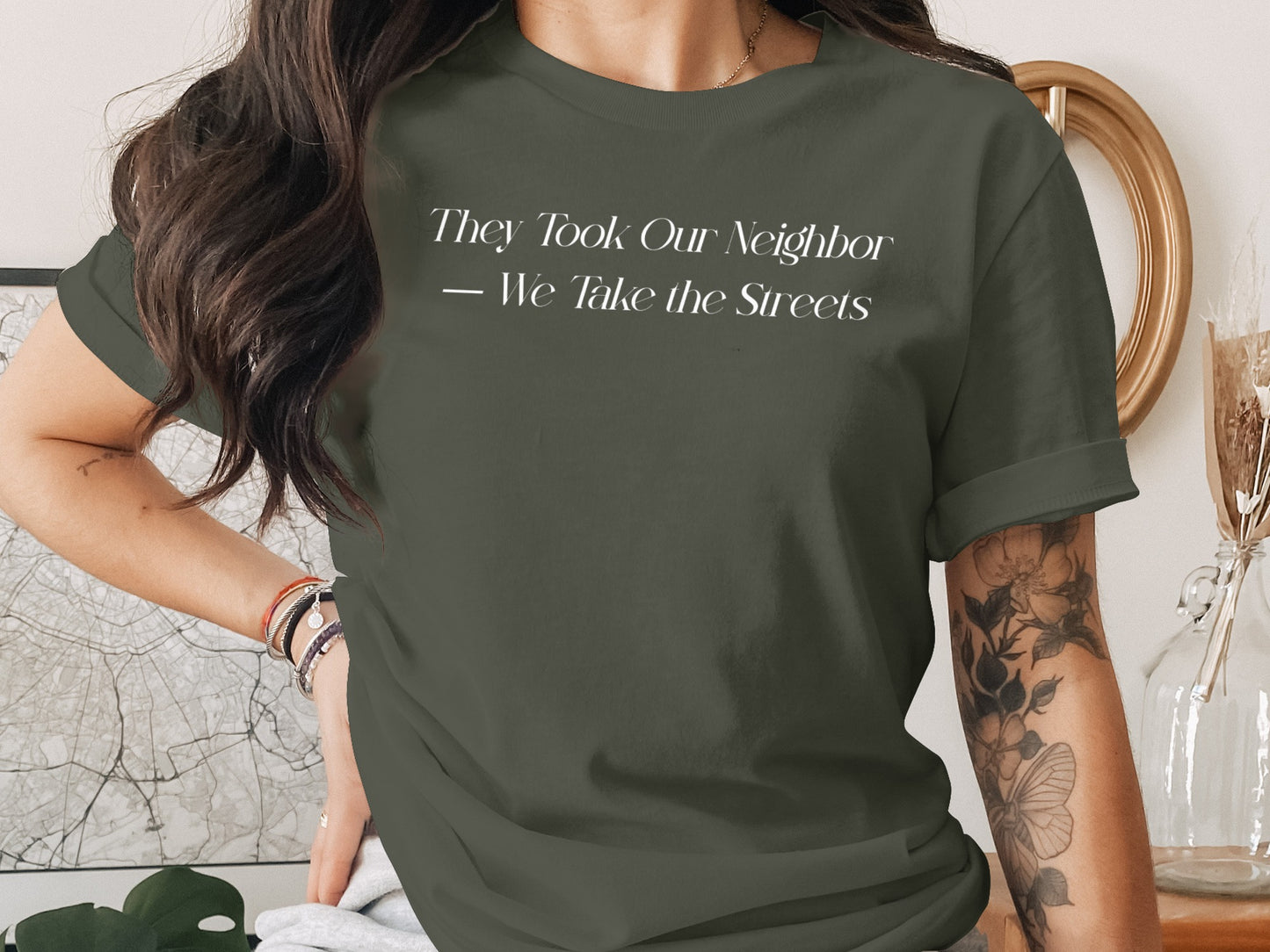 They Took Our Neighbor We Take the Streets t-shirt product