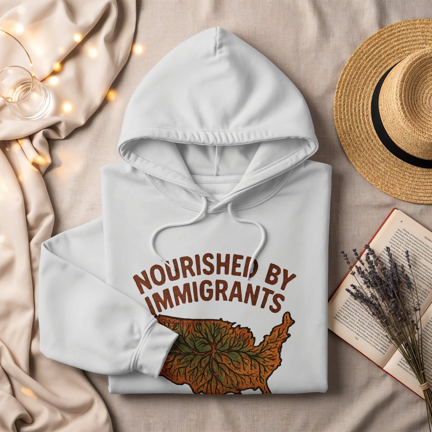 Nourished by Immigrants Hoodie Thoughtful Apparel product type