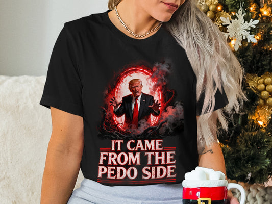 Black t-shirt with Trump, demonic imagery, and text "IT CAME FROM THE PEDO SIDE".
