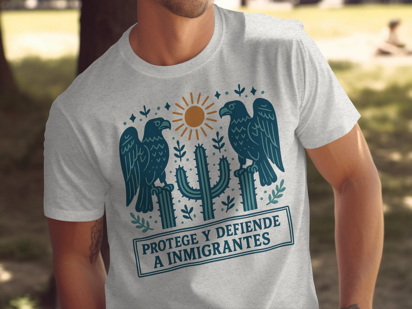 Protege Y Defiende A Inmigrantes Graphic T-Shirt product