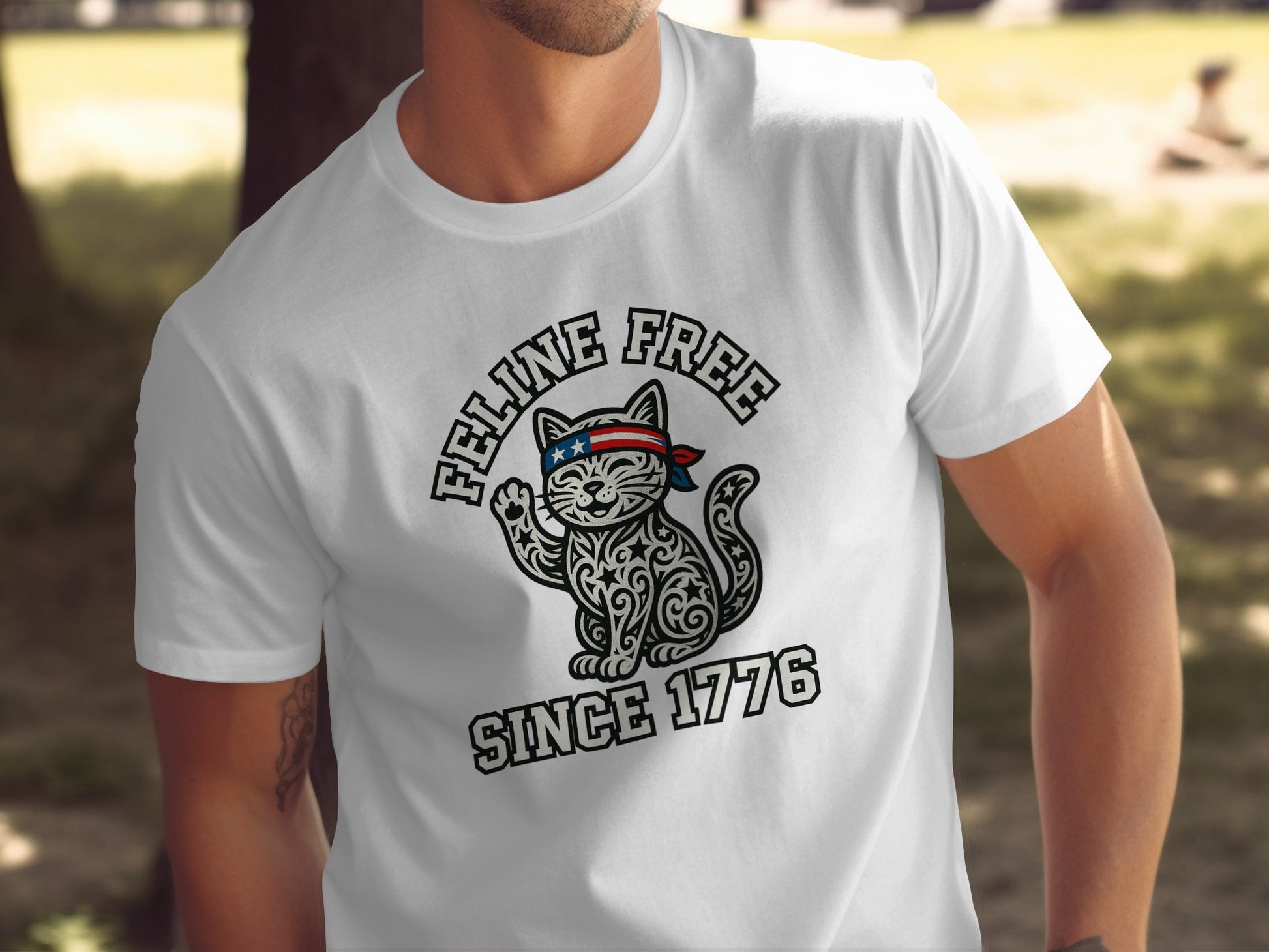 Feline Free Since 1776 Cat Graphic Tee product