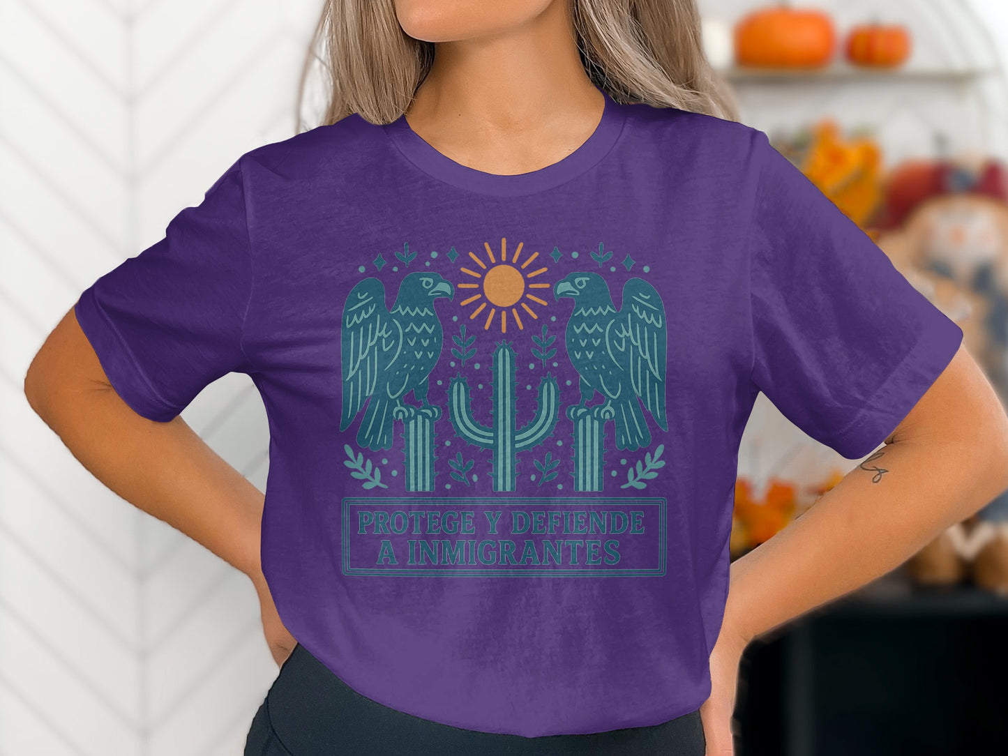Protege y Defiende A Inmigrantes Graphic T-Shirt product type
