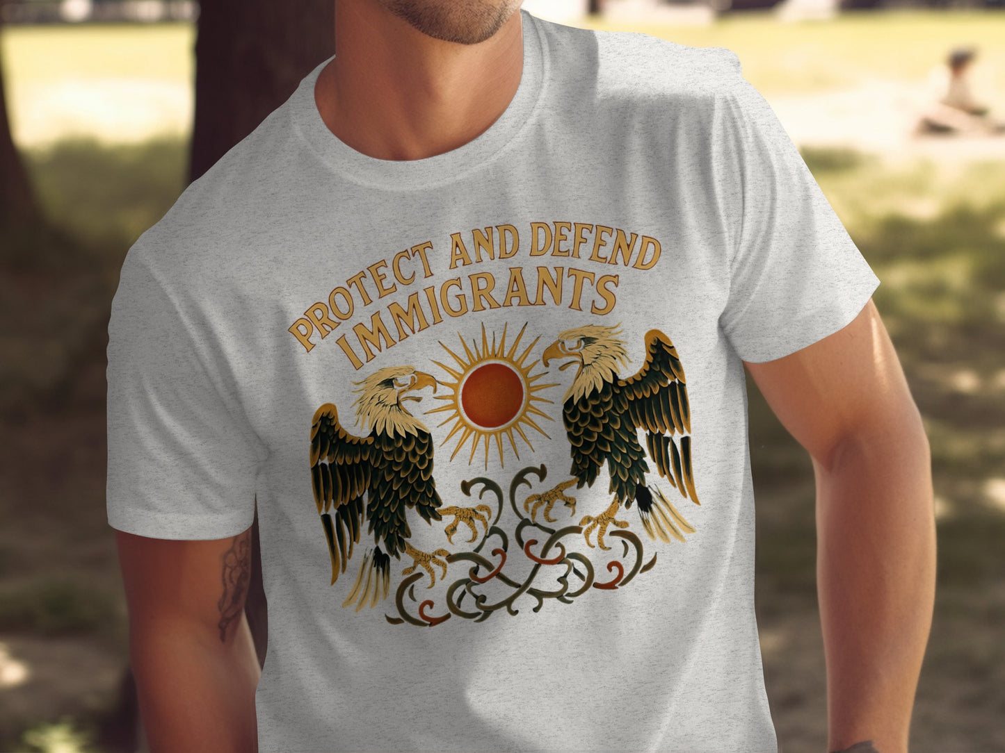 Protect and Defend Immigrants Graphic T-shirt Product