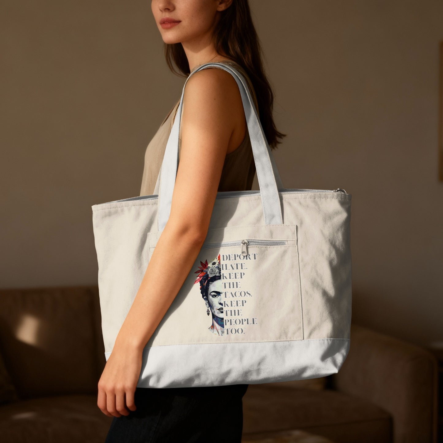 Tote bag featuring Frida Kahlo portrait with "DEPORT HATE KEEP THE TACOS KEEP THE PEOPLE TOO" text.