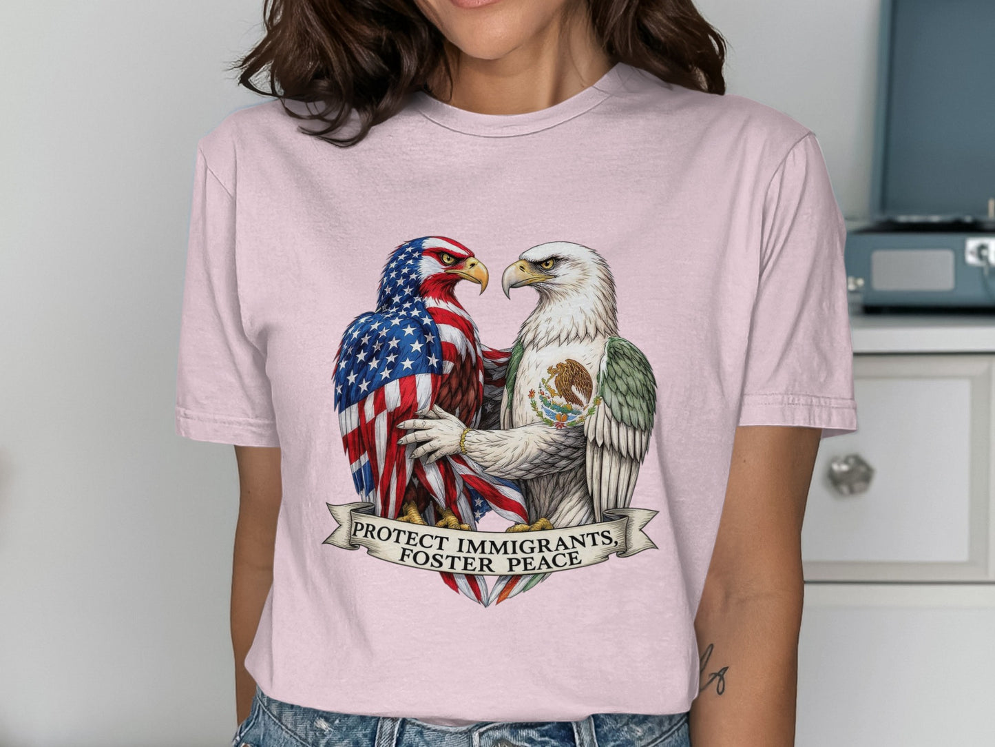 Protect Immigrants Foster Peace Graphic T-shirt product type