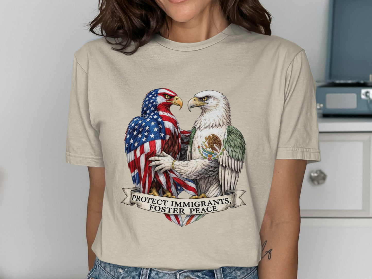 Protect Immigrants Foster Peace Graphic T-Shirt product