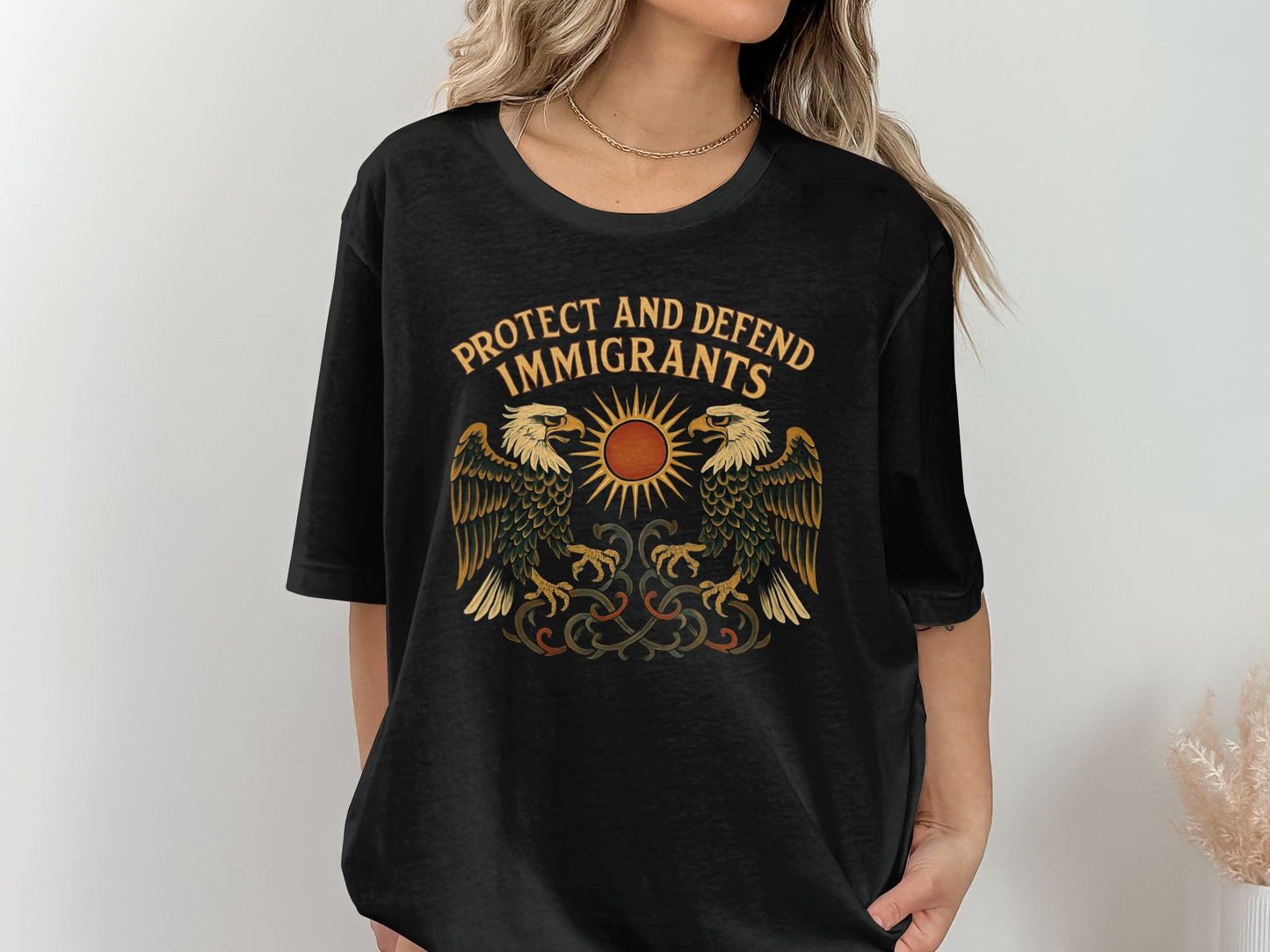 Protect And Defend Immigrants Graphic T-Shirt product