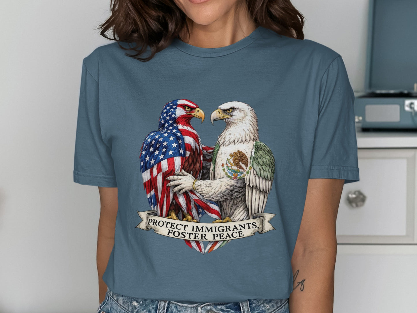 Protect Immigrants Foster Peace Graphic T-Shirt product type