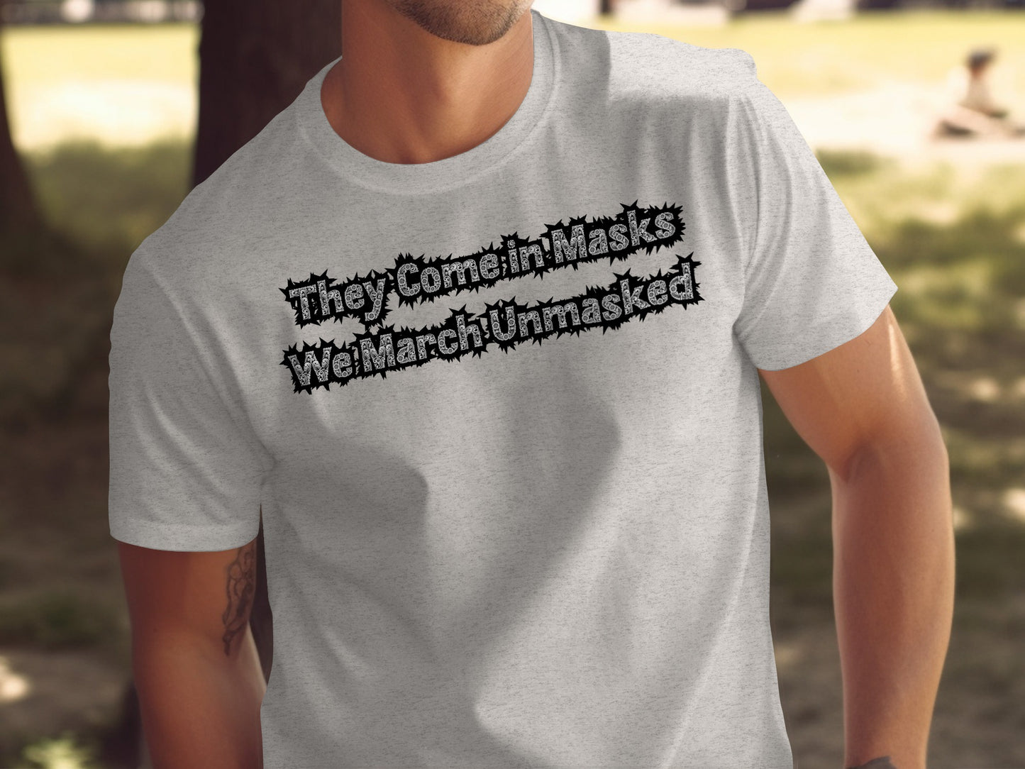 They Come in Masks We March Unmasked T-Shirt product type