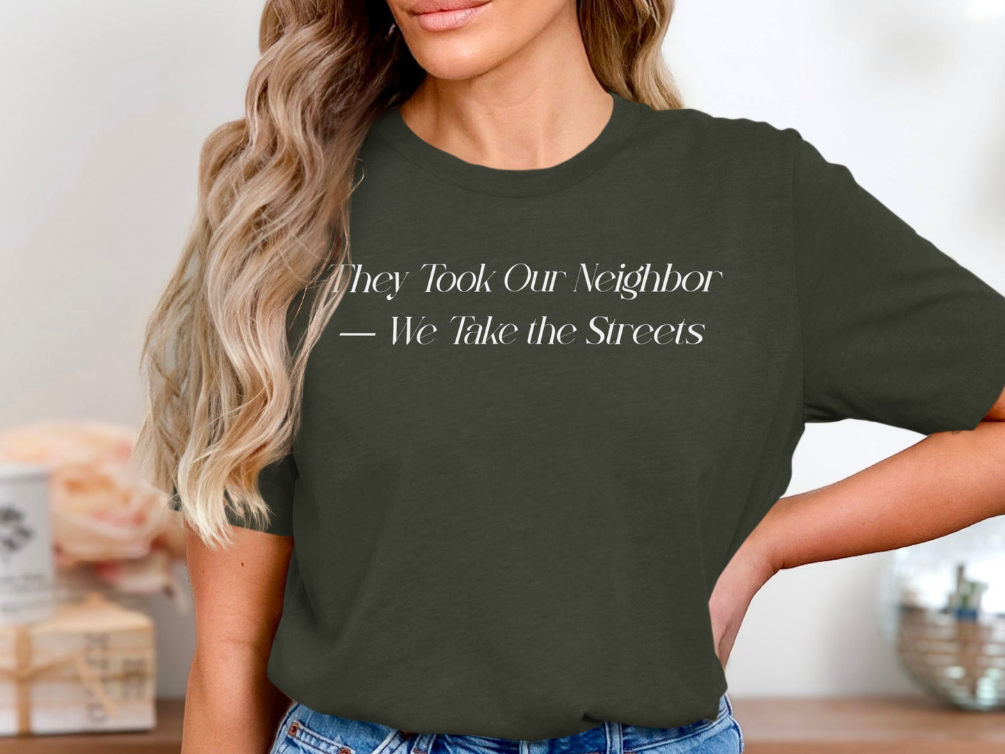 They Took Our Neighbor We Take the Streets T-Shirt product