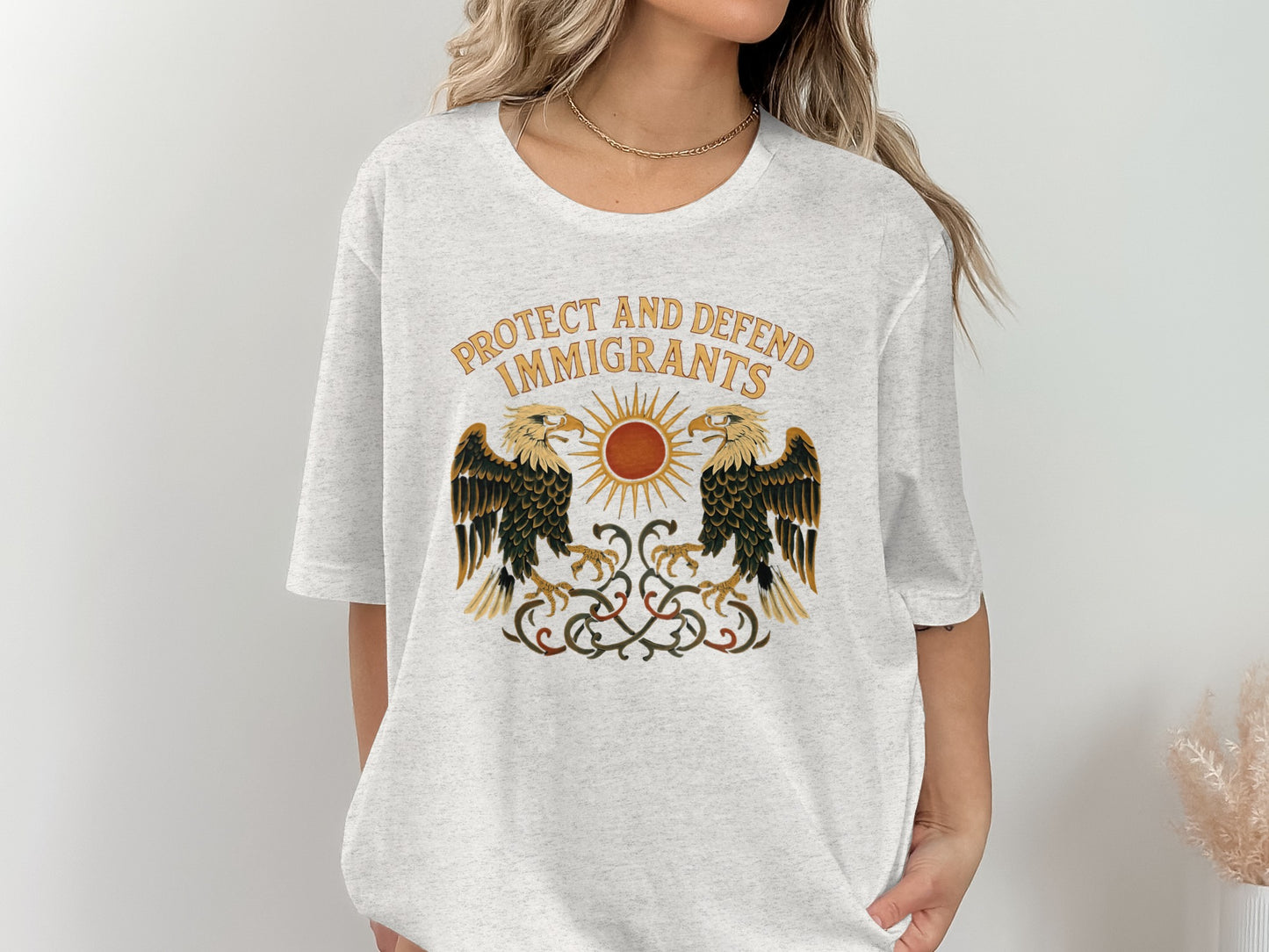 Protect and Defend Immigrants Graphic T-shirt product type