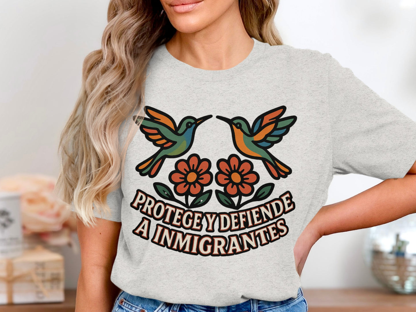 Protege y Defiende a Inmigrantes graphic t-shirt product type
