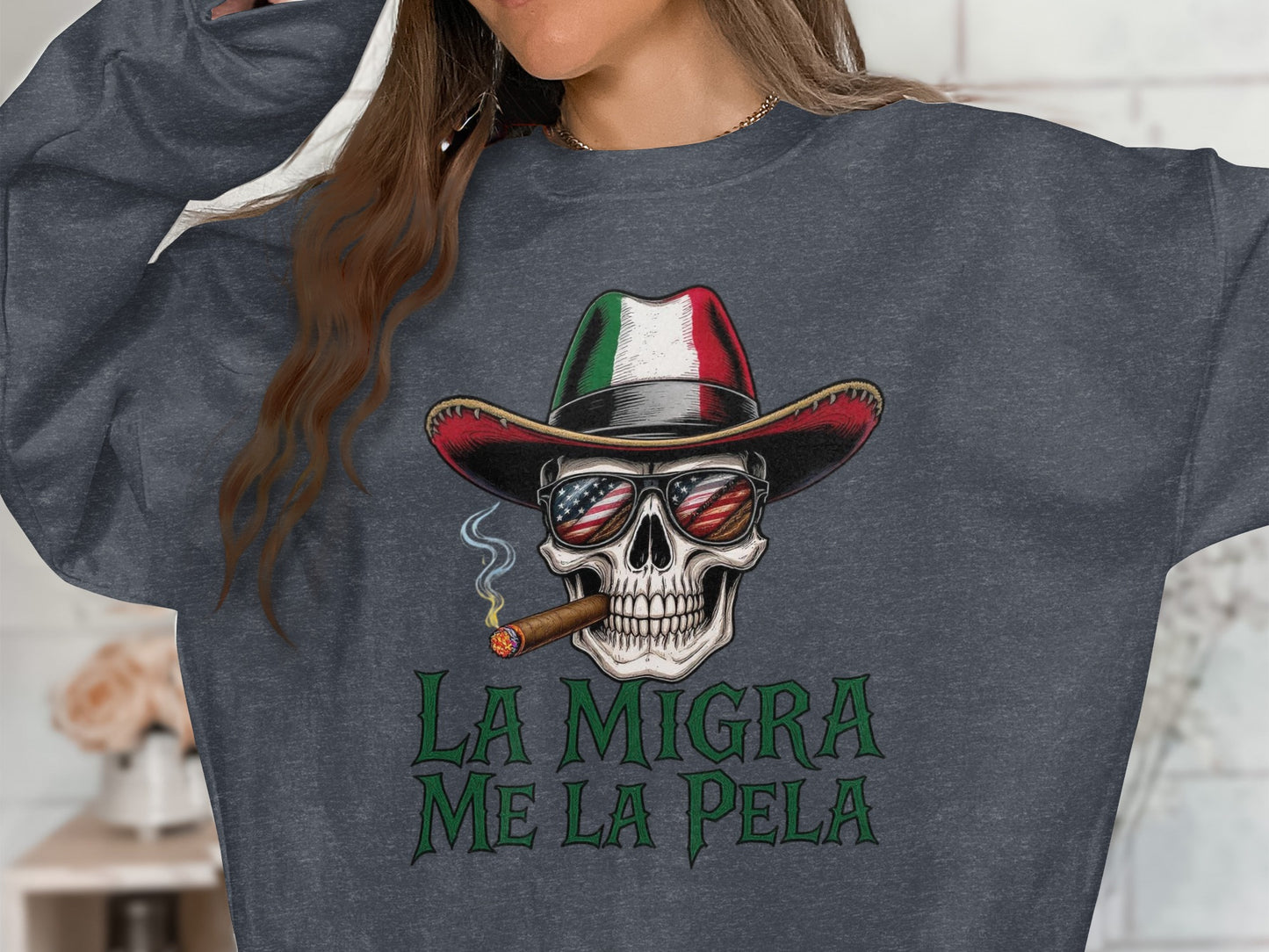 La Migra Me La Pela Skull Wearing Hat Sweatshirt Product