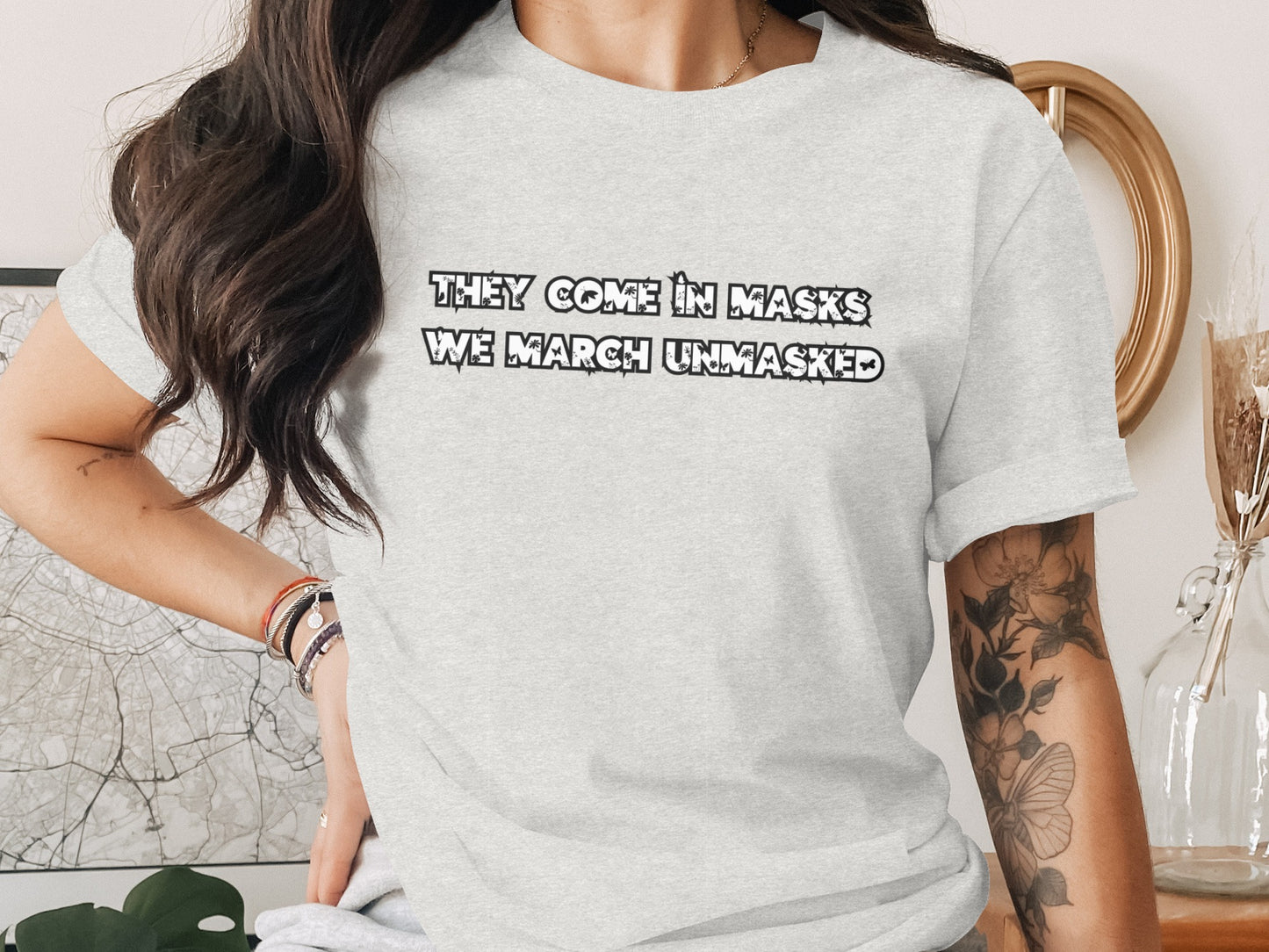 They Come In Masks We March Unmasked T-shirt product