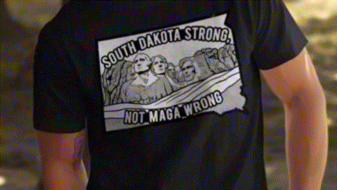 a person wearing a black t-shirt with a graphic design on the back.