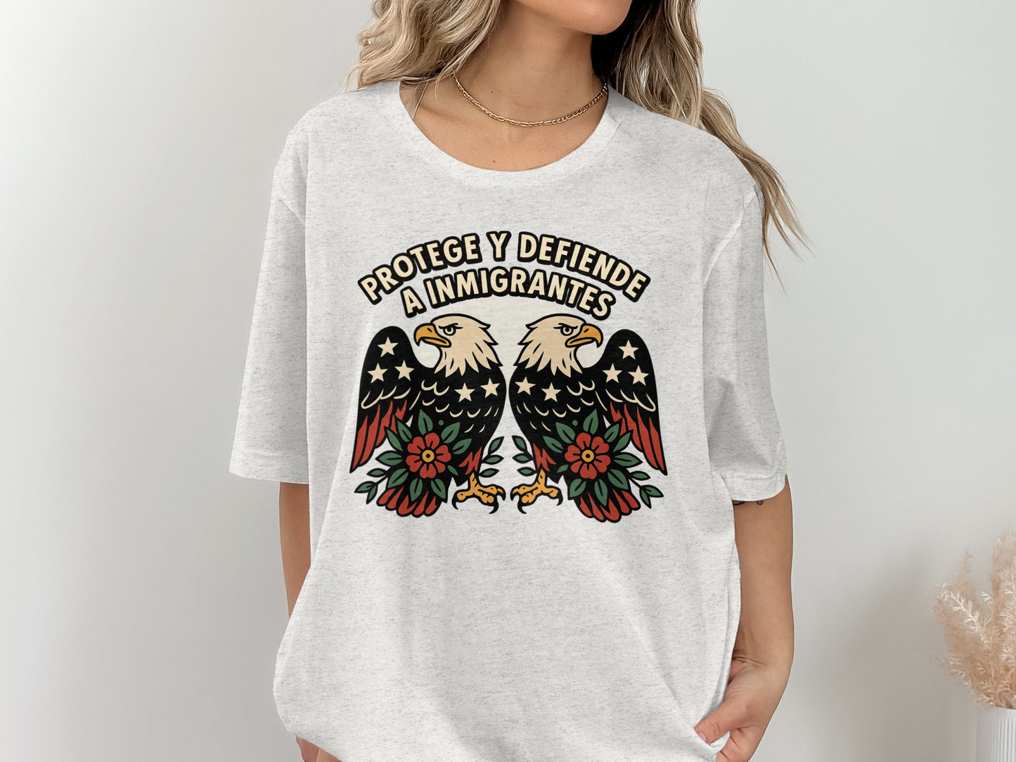 Protege Y Defiende A Inmigrantes Graphic Shirt Product