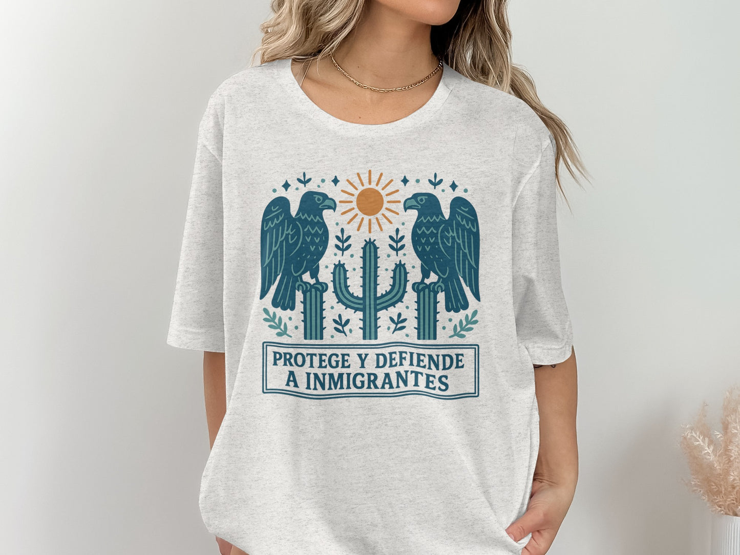 Protege y Defiende a Inmigrantes Graphic Tee product type