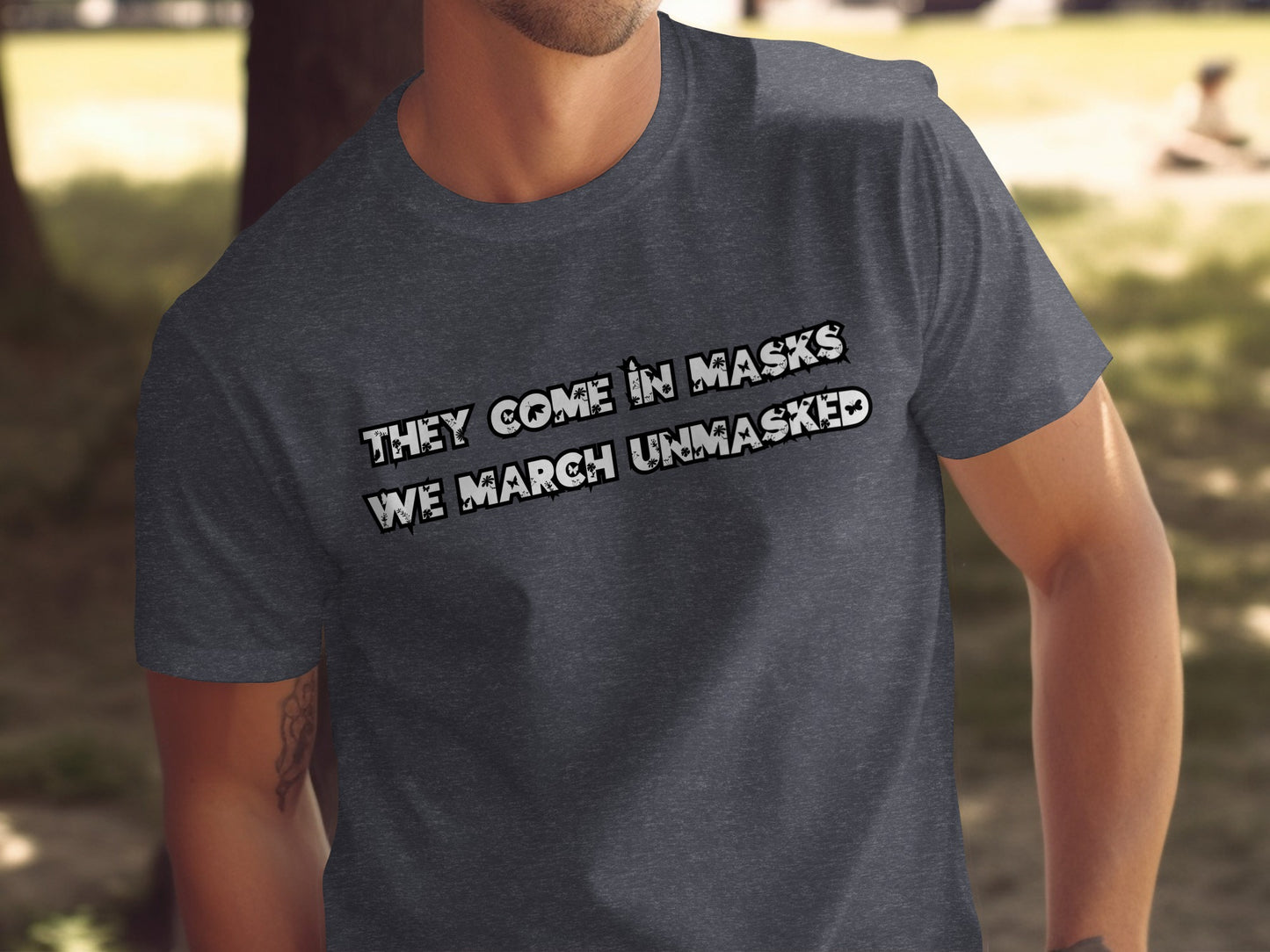 They Come in Masks We March Unmasked T-shirt product
