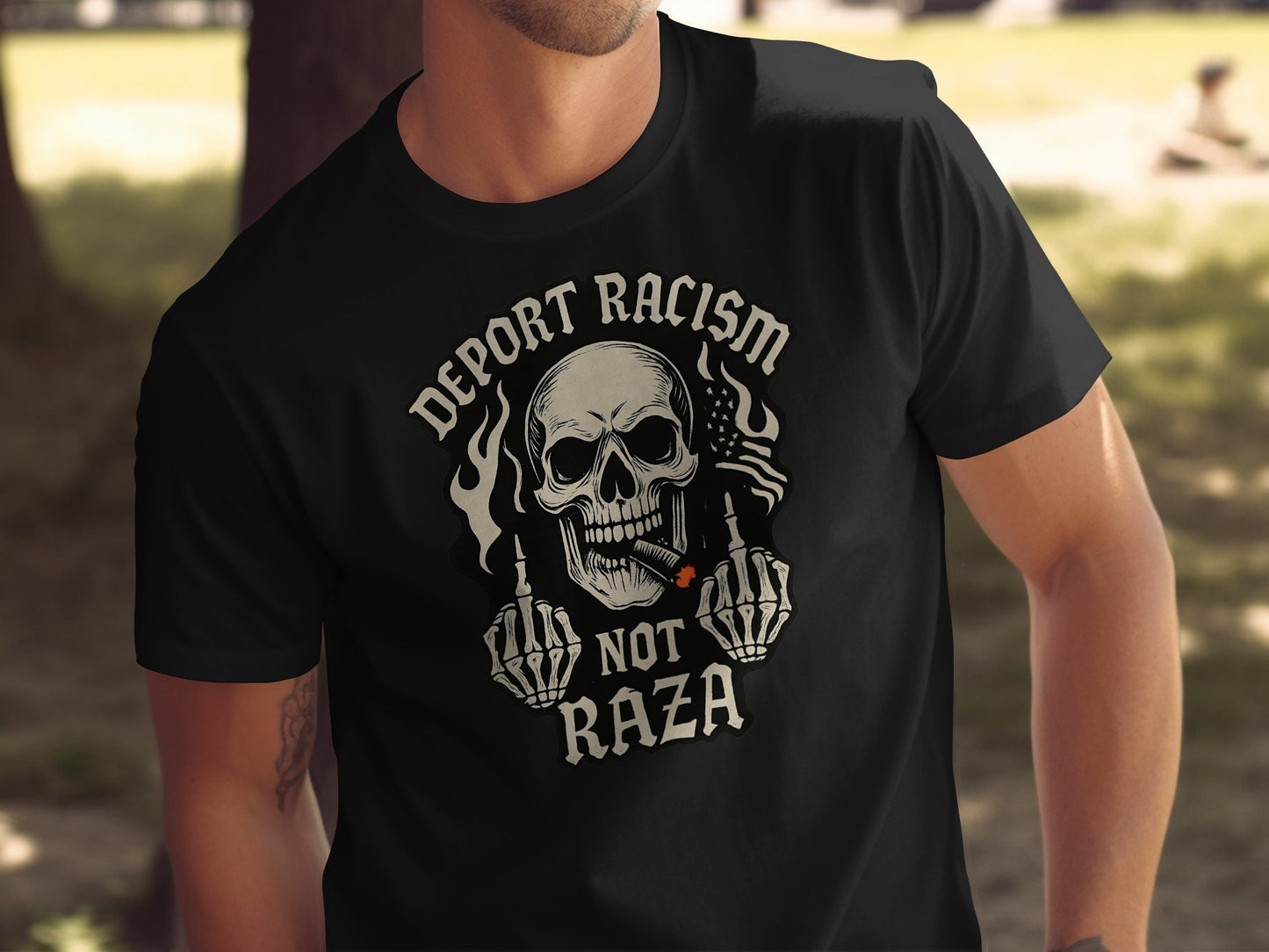 Deport Racism Not Raza Skull Graphic T-shirt product