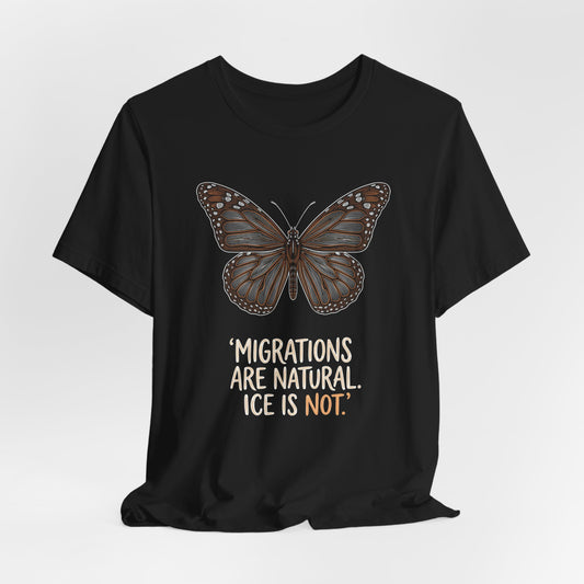 Black t-shirt with a brown monarch butterfly and the text "MigrATIONS ARE NATURAL. ICE IS NOT."