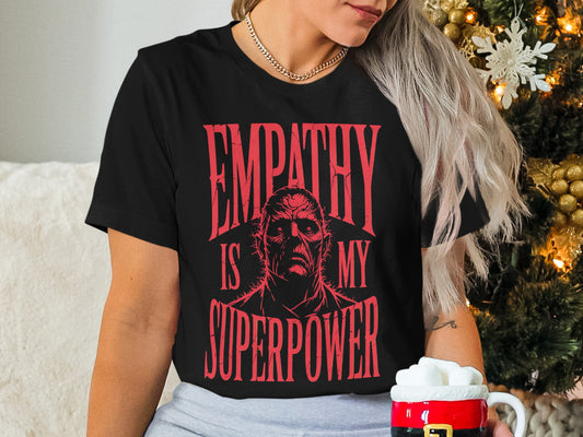 Black t-shirt with red text "EMPATHY IS MY SUPERPOWER" featuring a zombie face.