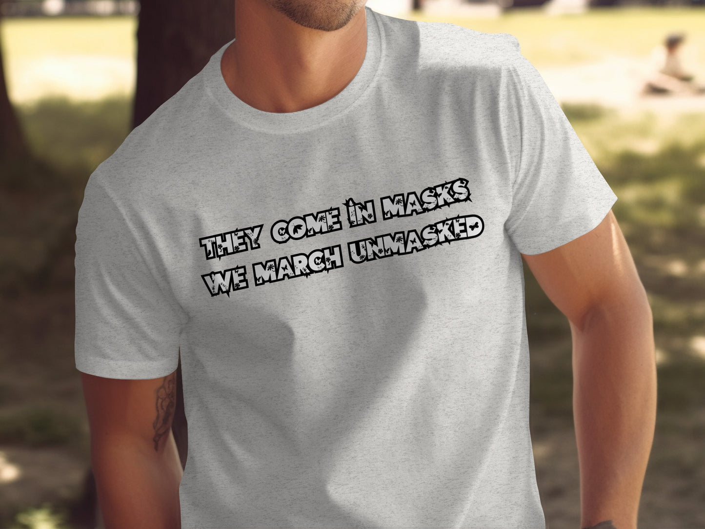 They Come in Masks We March Unmasked T-shirt product