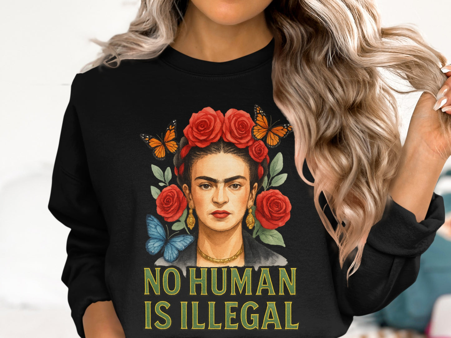 No Human Is Illegal Sweater Featuring Portrait Design
