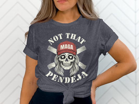 Woman wearing a dark t-shirt with "NOT THAT MAGA PENDEJA" and a skull graphic.