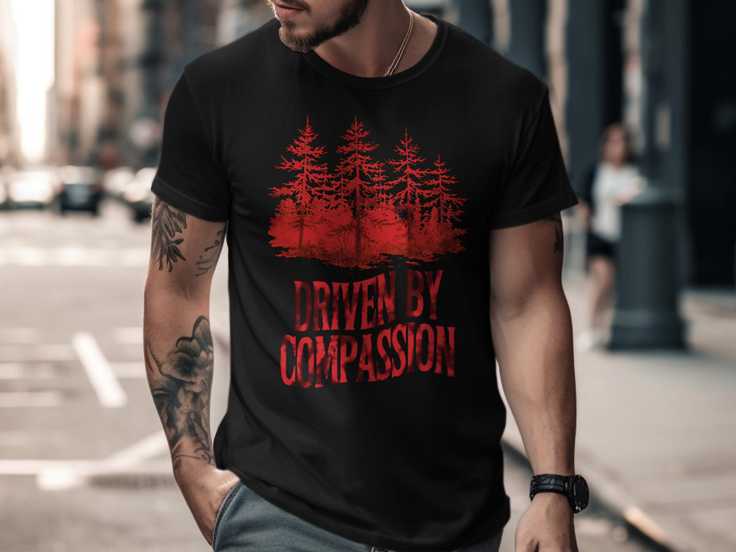 Black t-shirt with red forest graphic and "DRIVEN BY COMPASSION" text.