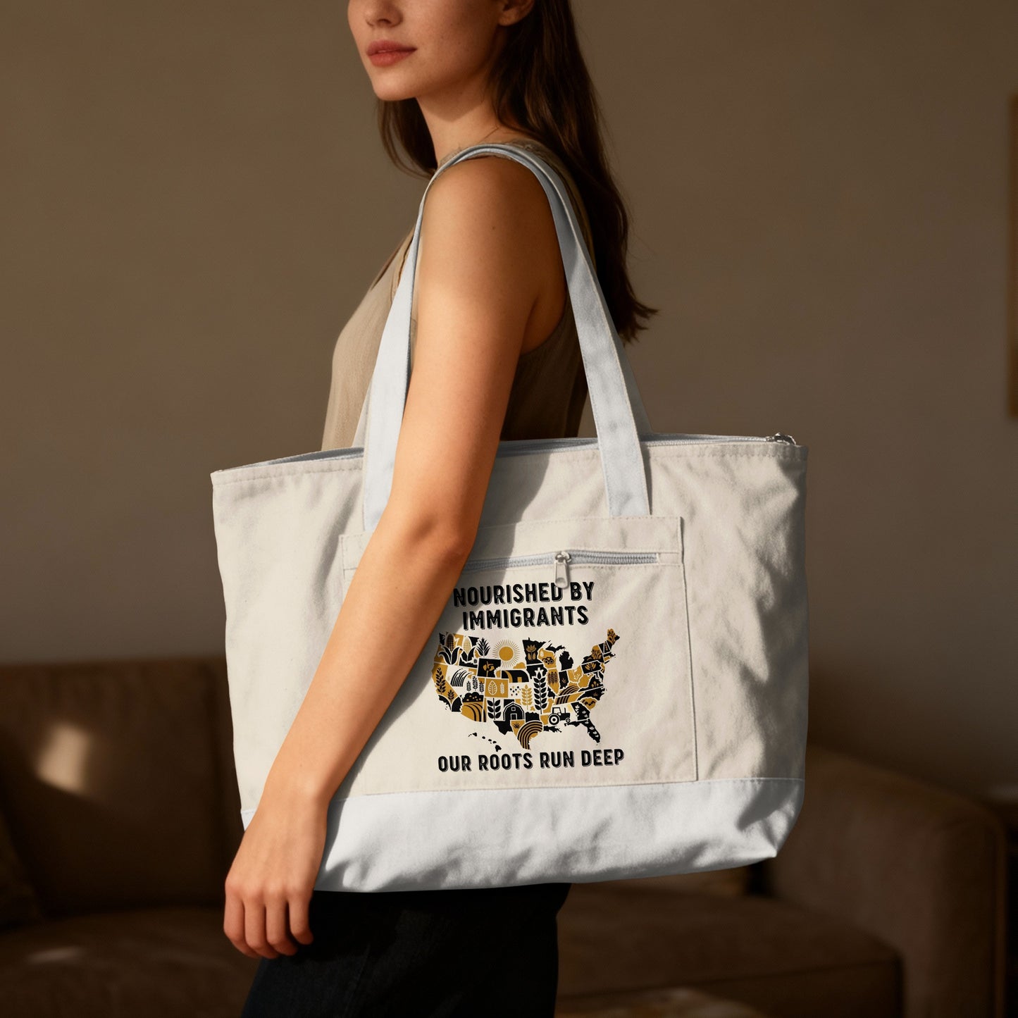 Tote bag featuring a map of the US with text "Nourished by Immigrants. Our Roots Run Deep."