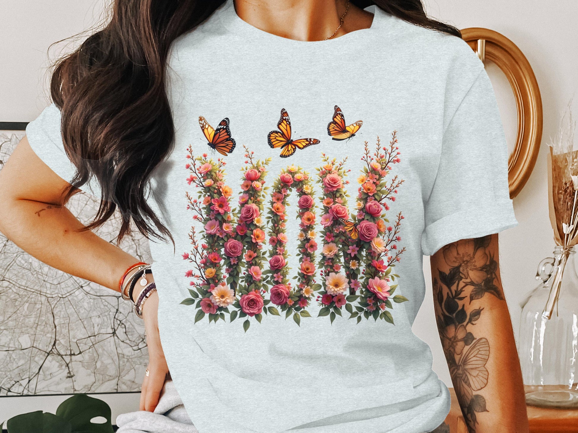 Vibrant Butterfly and Floral Design Women's Shirt Product
