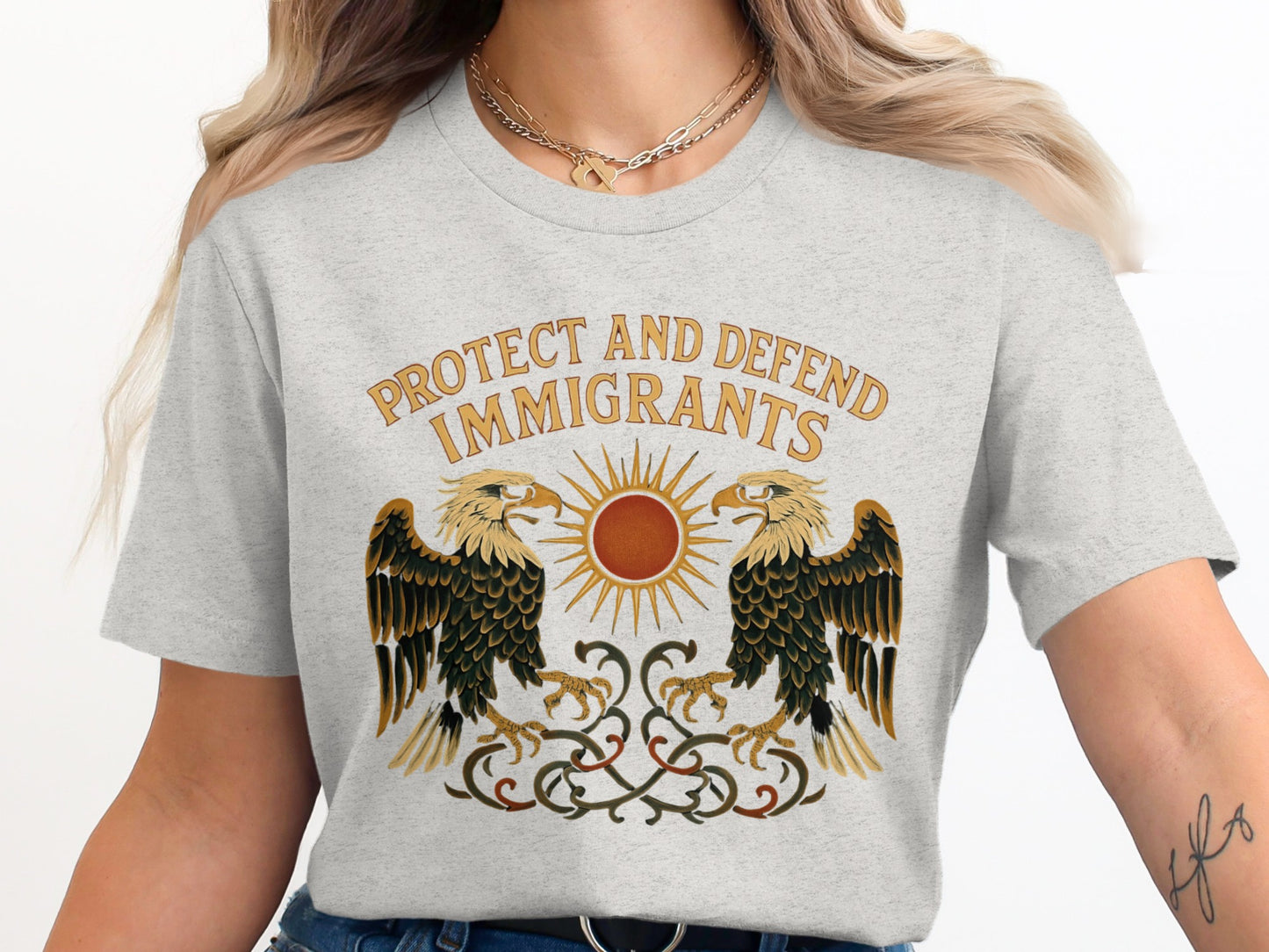 Protect and Defend Immigrants Graphic Tee product