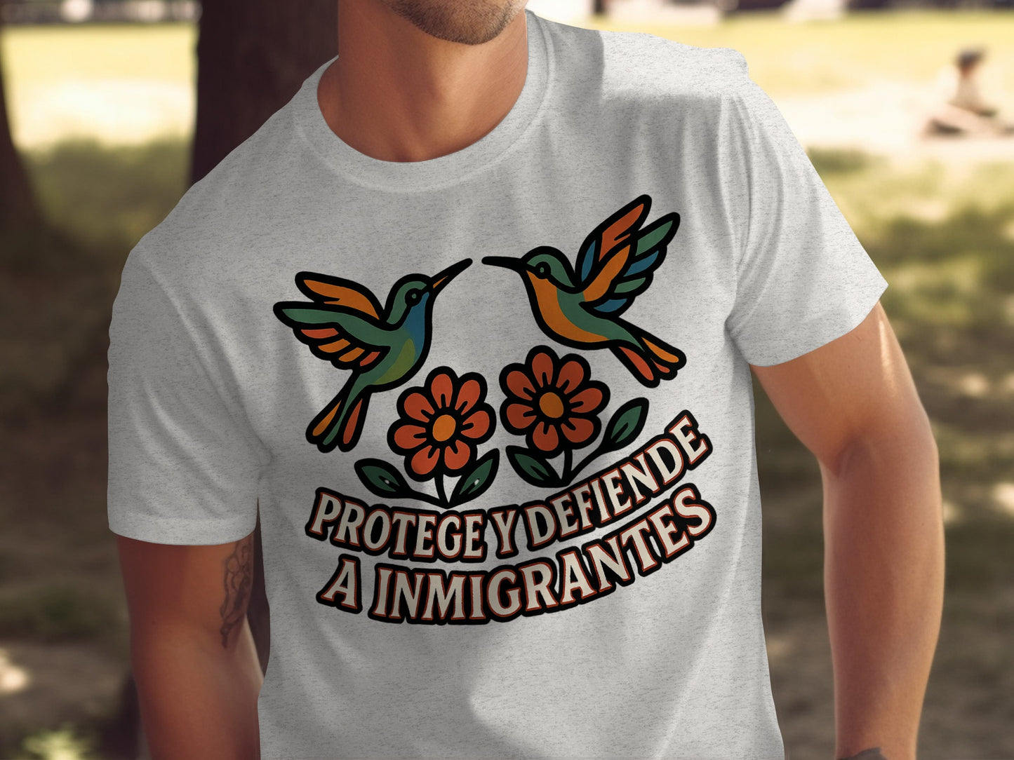 Protege y Defiende a Inmigrantes Graphic T-shirt product type