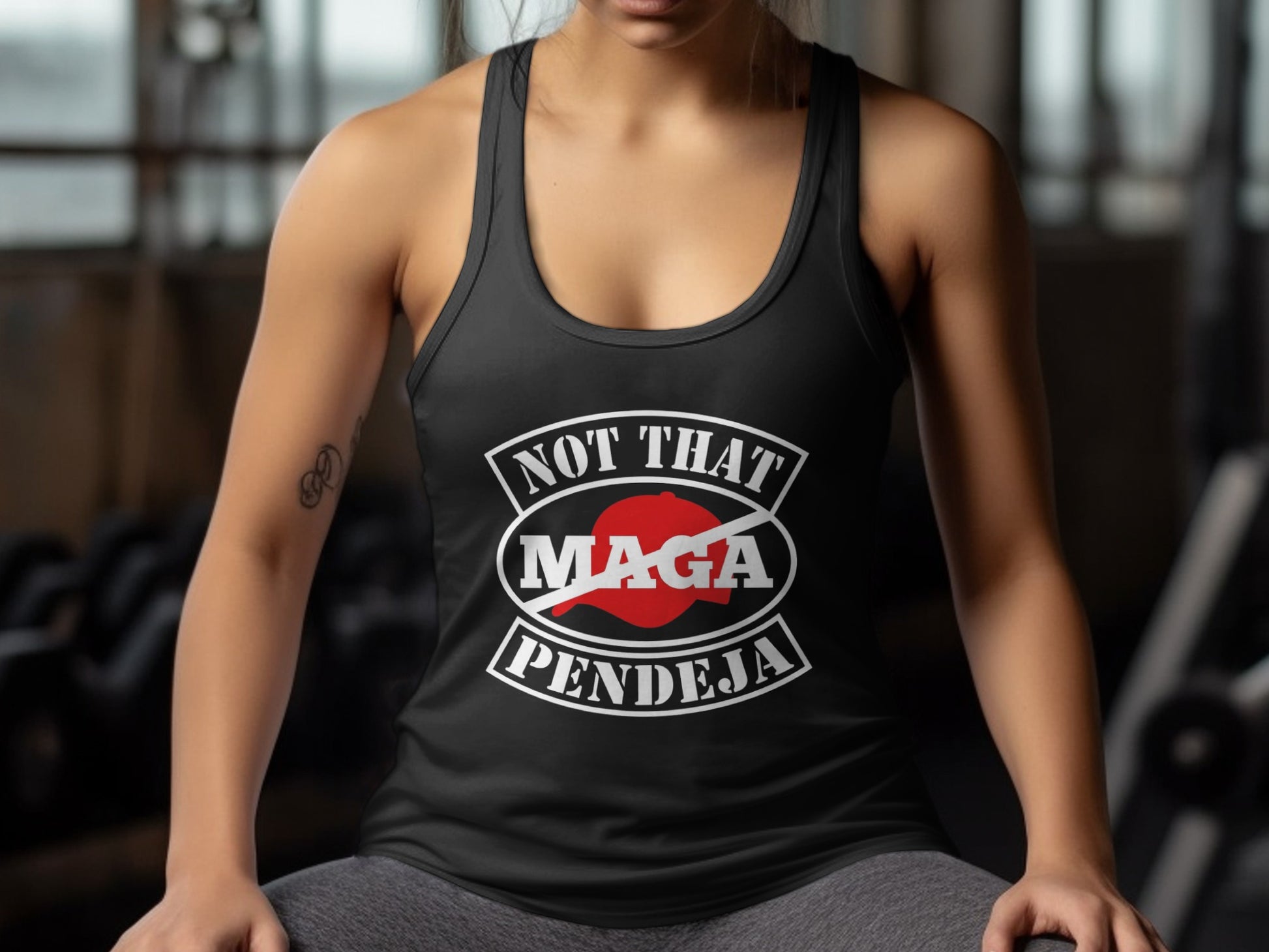 Black tank top with "Not That MAGA Pendeja" slogan in white text.