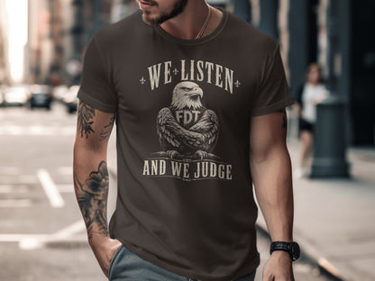 Dark t-shirt with "WE LISTEN AND WE JUDGE" text and eagle graphic.