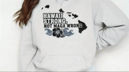 A person wearing a white sweatshirt with a graphic design on it.
