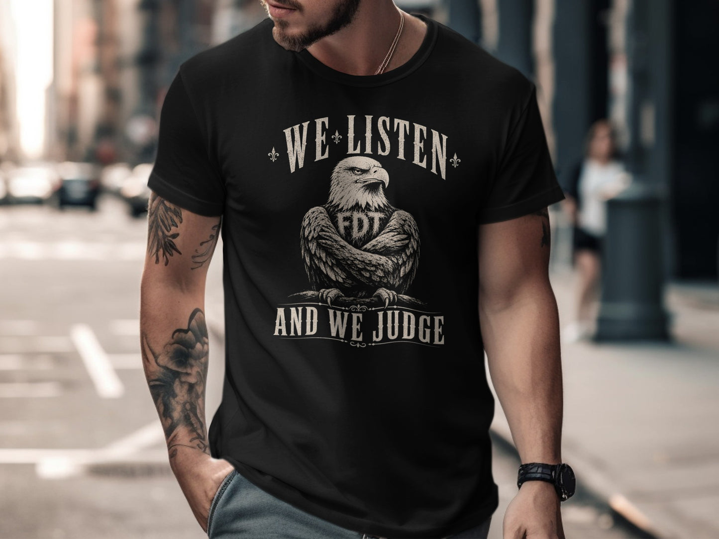 Black t-shirt with eagle graphic and text "WE LISTEN AND WE JUDGE FDT".