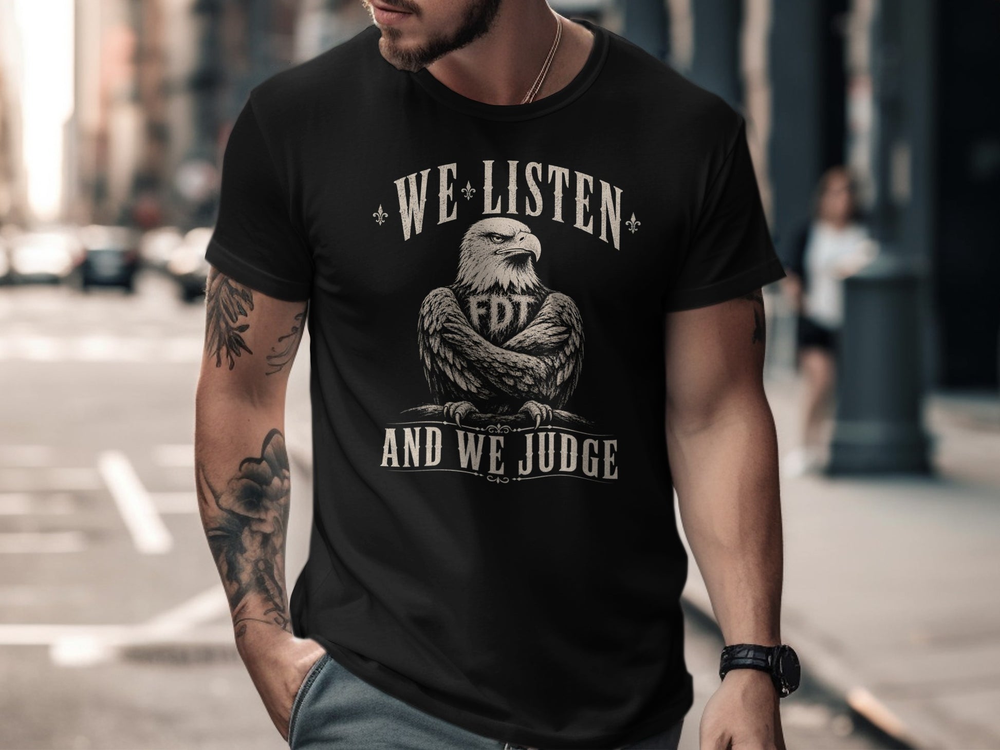 Black t-shirt with eagle graphic and text "WE LISTEN AND WE JUDGE FDT".