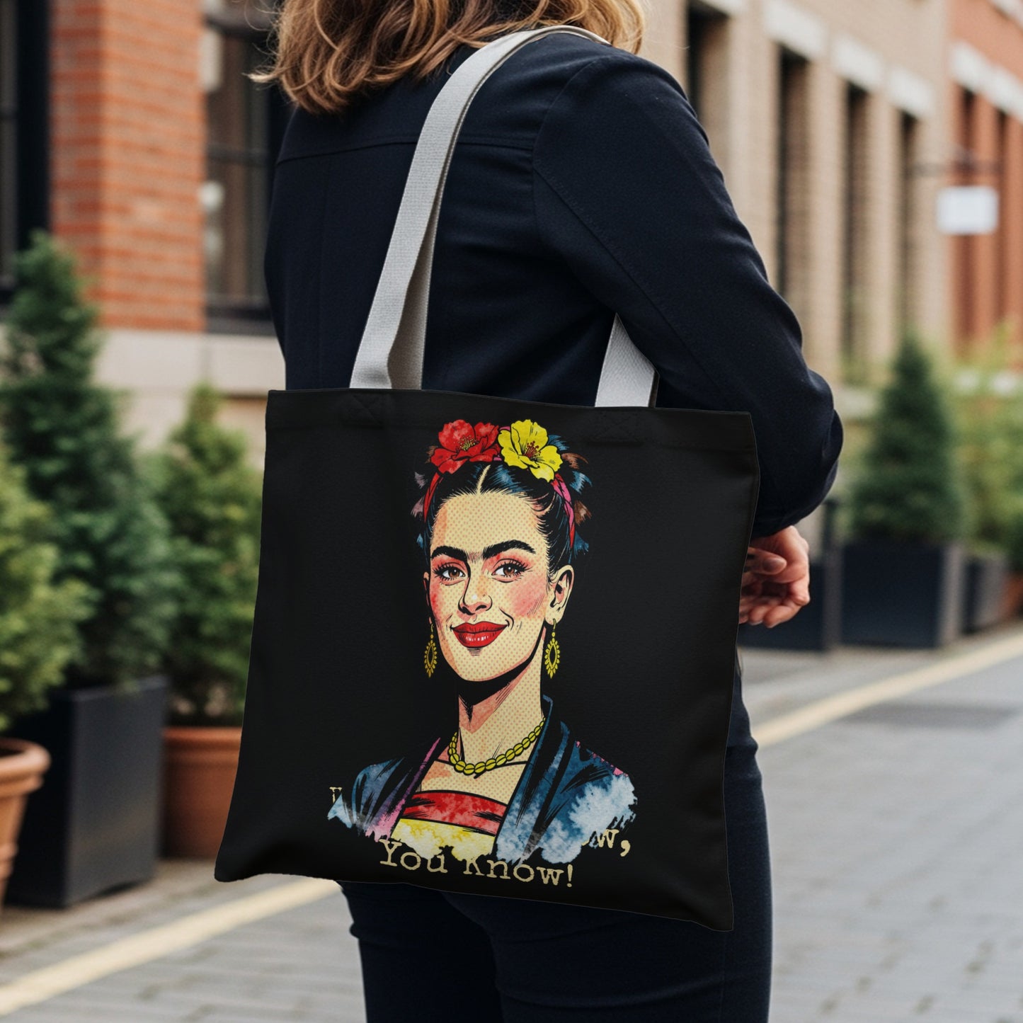Frida Kahlo portrait on black tote bag with "Self-Portrait" and "You Know!" text.