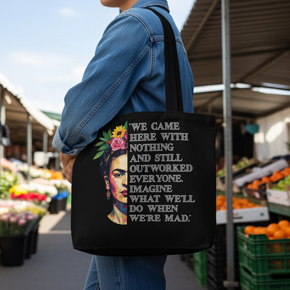 Black tote bag with Frida Kahlo image and empowering quote.