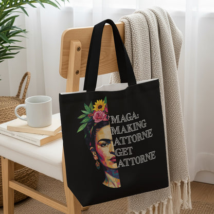 Black tote bag with Frida Kahlo portrait and text "MAGA: MAKING ATTORNE GET ATTENTION"