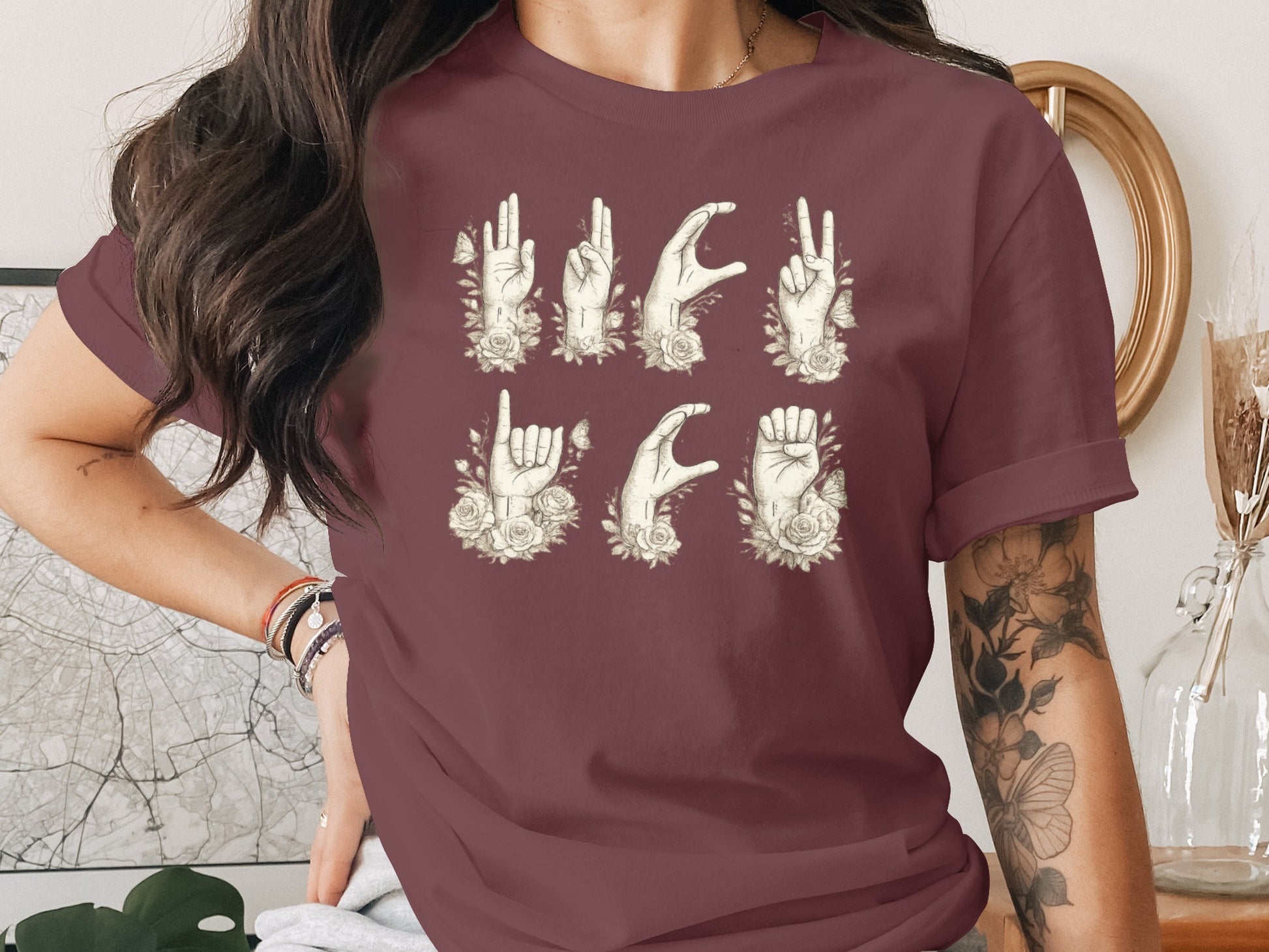Floral Hand Gesture Graphic on Maroon T-shirt