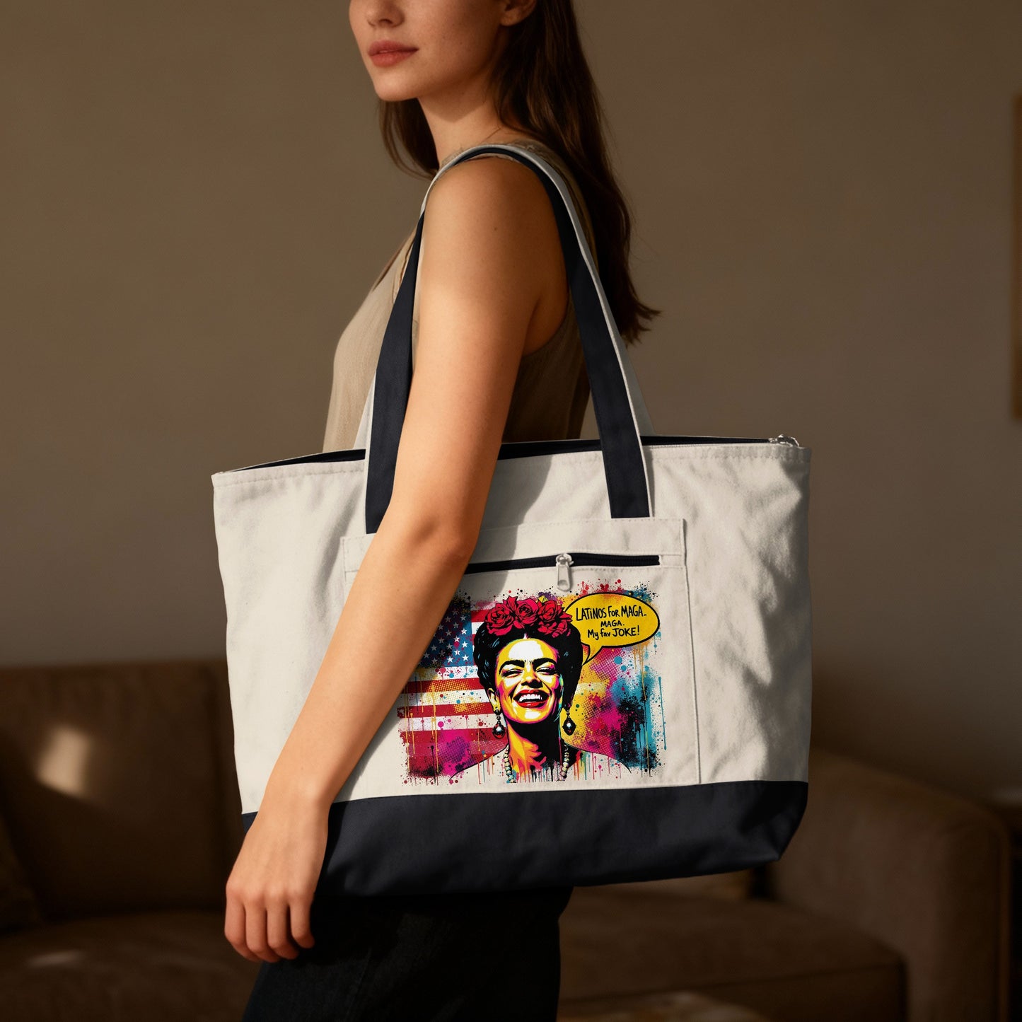 Woman holding canvas tote bag with Frida Kahlo-inspired graphic.