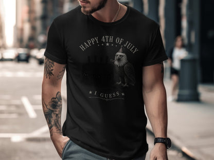 Black t-shirt with eagle and cake graphic, "Happy 4th of July I Guess" text.