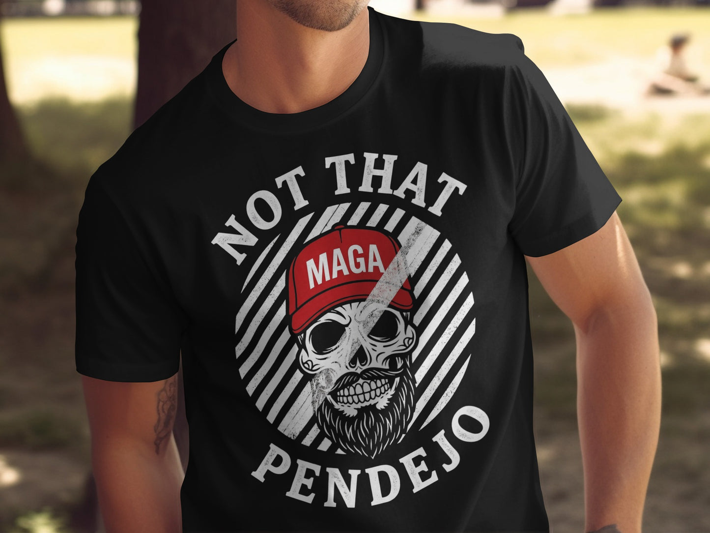 Black t-shirt with "NOT THAT MAGA PENDEJO" text and skull graphic.