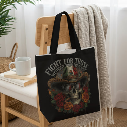 Black tote bag with skull, cigar, roses, and "Fight for those without your privilege" text.